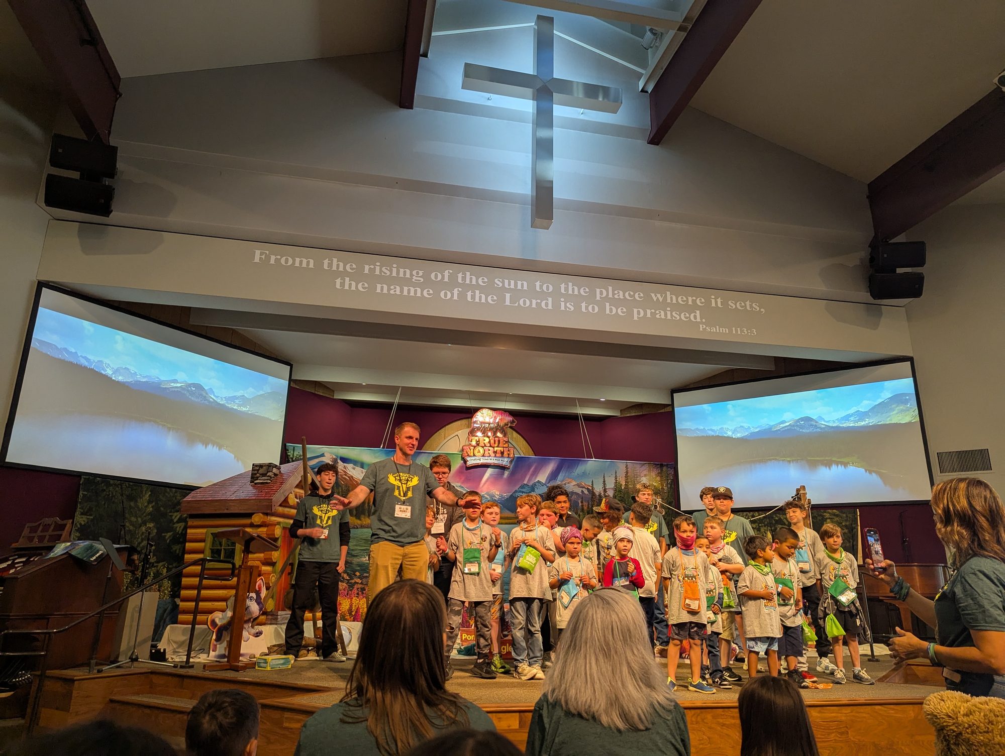 Kids and leaders on stage during True North Vacation Bible School